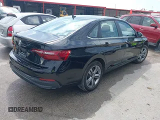 2024 Volkswagen Jetta SE with VIN 3VW7M7BU0RM059133, listed as a IAAI auction lot 42553729 with 13,091 mi miles and . Bid and sale history available at DreamBid. Image 4.