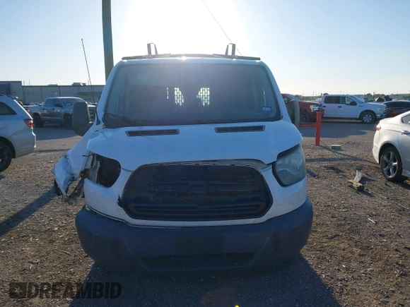 2016 Ford Transit Cargo z VIN 1FTYE1YM2GKB48893, wystawiony jako IAAI lot #41915007 z przebiegiem 234 934 mil mil oraz . Historia ofert i sprzedaży dostępna na DreamBid. Obrazek 12.