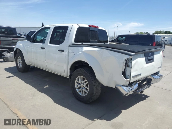 2017 Nissan Frontier Pro-4X with VIN 1N6AD0EVXHN718230, listed as a Copart auction lot 57074855 with 238,382 mi miles and Salvage title. Bid and sale history available at DreamBid. Image 2.