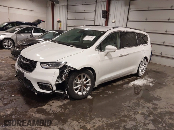 2021 Chrysler Pacifica Touring L with VIN 2C4RC1BG3MR504293, listed as a IAAI auction lot 41728608 with 70,487 mi miles and . Bid and sale history available at DreamBid. Image 21.