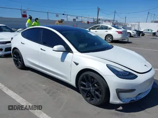 2019 Tesla Model 3 Mid Range with VIN 5YJ3E1EA5KF327181, listed as a IAAI auction lot 41860943 with 157,335 mi miles and . Bid and sale history available at DreamBid. Image 1.