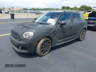 2018 MINI Countryman Cooper S z VIN WMZYT3C35J3E00804, wystawiony jako IAAI lot #42194381 z przebiegiem 101 634 mil mil oraz . Historia ofert i sprzedaży dostępna na DreamBid. Obrazek 2.