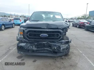 2022 Ford F-150 XL with VIN 1FTFW1E83NFB19601, listed as a IAAI auction lot 41723187 with 21,002 mi miles and . Bid and sale history available at carsss.com. Image 6.