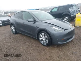 2023 Tesla Model Y Long Range with VIN 7SAYGDEE7PF894362, listed as a IAAI auction lot 41512492 with 27,513 mi miles. Bid and sale history available at carsss.com. Image 1.