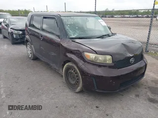 2010 Scion xB with VIN JTLZE4FE2A1117808, listed as a IAAI auction lot 41910113 with 242,060 mi miles. Bid and sale history available at carsss.com. Image 1.