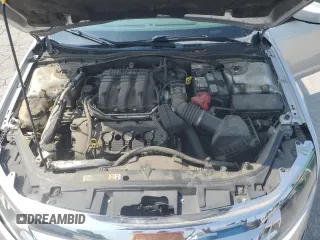 2012 Ford Fusion SEL z VIN 3FAHP0JG3CR178411, wystawiony jako Copart lot #59526405 z przebiegiem 208 550 mil mil oraz Szkoda całkowita • Salvage title. Historia ofert i sprzedaży dostępna na DreamBid. Obrazek 11.