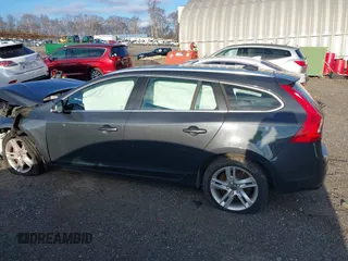 2015 Volvo V60 T5 Premier with VIN YV1612SK9F1263862, listed as a IAAI auction lot 41235823 with 101,303 mi miles. Bid and sale history available at carsss.com. Image 14.