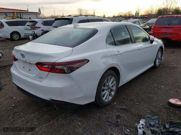 2024 Toyota Camry LE with VIN 4T1C11AK5RU899617, listed as a IAAI auction lot 41810634 with 24,295 mi miles. Bid and sale history available at carsss.com. Image 4.