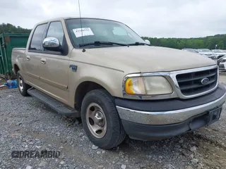 2001 Ford F-150 XLT with VIN 1FTRW07W71KE07190, listed as a IAAI auction lot 42350155 with Not provided miles and . Bid and sale history available at DreamBid. Image 1.