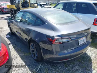 2022 Tesla Model 3 with VIN 5YJ3E1EA0NF344782, listed as a IAAI auction lot 41803469 with 16,973 mi miles and . Bid and sale history available at DreamBid. Image 3.