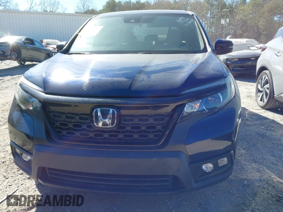 2020 Honda Passport EX-L with VIN 5FNYF7H58LB005866, listed as a IAAI auction lot 41695363 with Not provided miles and . Bid and sale history available at DreamBid. Image 12.