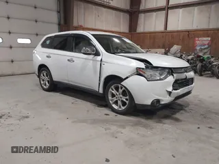 2014 Mitsubishi Outlander GT z VIN JA4JZ4AX8EZ016523, wystawiony jako IAAI lot #42101402 z przebiegiem 137 602 mil mil oraz . Historia ofert i sprzedaży dostępna na DreamBid. Obrazek 1.