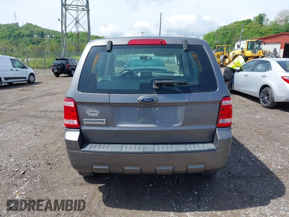2009 Ford Escape XLS z VIN 1FMCU02709KC11692, wystawiony jako IAAI lot #42202890 z przebiegiem 155 243 mil mil oraz . Historia ofert i sprzedaży dostępna na DreamBid. Obrazek 16.