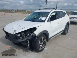 2017 Hyundai Tucson Value with VIN KM8J33A27HU564306, listed as a IAAI auction lot 40983257 with 53,590 mi miles. Bid and sale history available at carsss.com. Image 2.