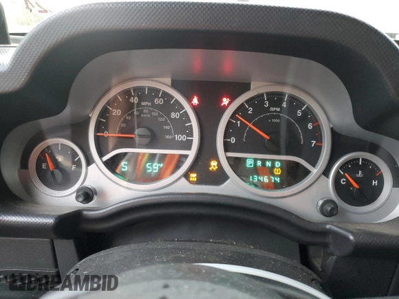 2008 Jeep Wrangler Unlimited Sahara with VIN 1J4GA59148L574934, listed as a Copart auction lot 74590164 with 134,674 mi miles and Salvage title. Bid and sale history available at DreamBid. Image 9.