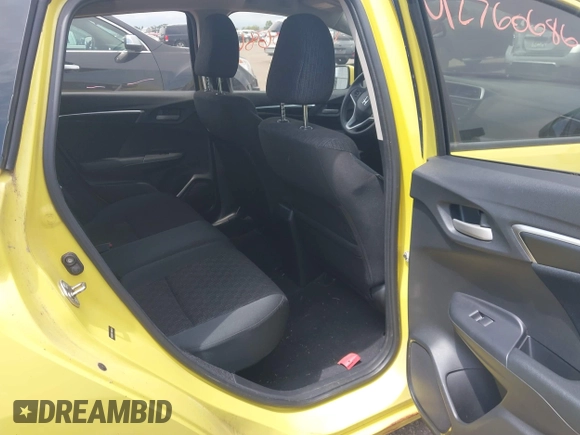 2015 Honda Fit LX z VIN 3HGGK5H58FM768970, wystawiony jako IAAI lot #42760686 z przebiegiem 89 531 mil mil oraz . Historia ofert i sprzedaży dostępna na DreamBid. Obrazek 8.