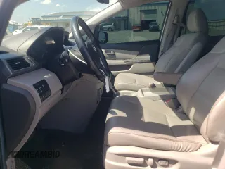 2012 Honda Odyssey Touring with VIN 5FNRL5H94CB009952, listed as a Copart auction lot 54322695 with 135,551 mi miles and Salvage title. Bid and sale history available at DreamBid. Image 7.