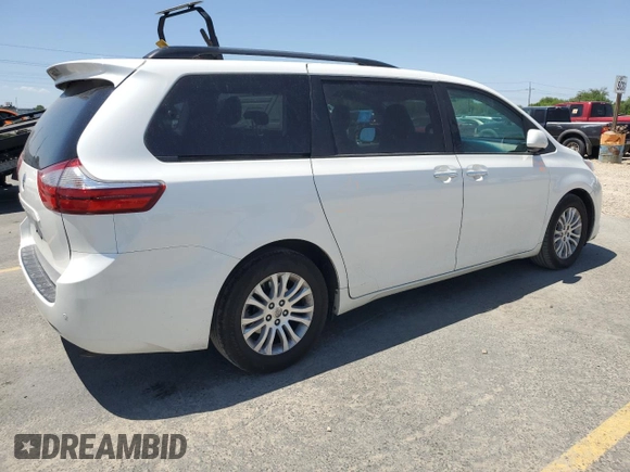 2015 Toyota Sienna XLE with VIN 5TDYK3DC1FS690219, listed as a Copart auction lot 60926525 with 97,879 mi miles and Salvage title. Bid and sale history available at DreamBid. Image 3.