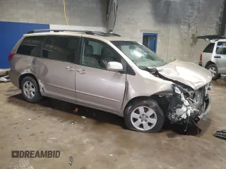 2009 Toyota Sienna XLE with VIN 5TDZK22C19S228023, listed as a Copart auction lot 57072295 with 148,080 mi miles and Salvage title. Bid and sale history available at DreamBid. Image 4.
