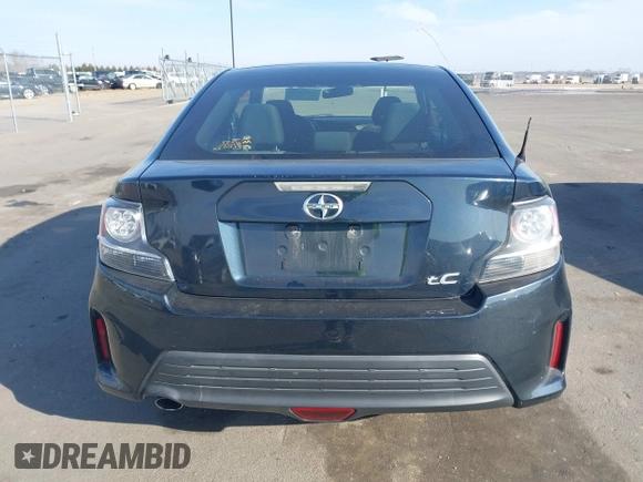 2015 Scion tC with VIN JTKJF5C71F3090963, listed as a IAAI auction lot 41802183 with 107,650 mi miles. Bid and sale history available at carsss.com. Image 16.