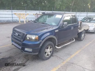 2004 Ford F-150 XLT z VIN 1FTPX14574NC36613, wystawiony jako IAAI lot #42741713 z przebiegiem 156 494 mil mil oraz . Historia ofert i sprzedaży dostępna na DreamBid. Obrazek 2.