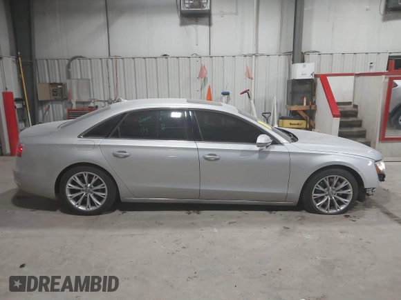 2011 Audi A8 with VIN WAURVAFD5BN014214, listed as a IAAI auction lot 41396044 with 131,764 mi miles and . Bid and sale history available at DreamBid. Image 14.