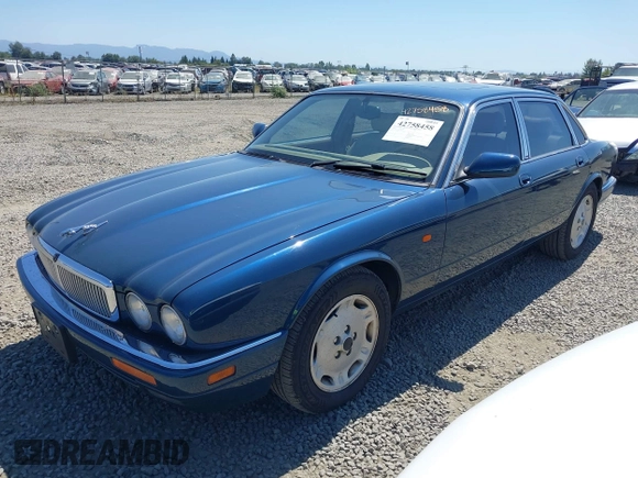 1996 Jaguar XJ with VIN SAJHX1740TC766425, listed as a IAAI auction lot 42758458 with 257,849 mi miles and . Bid and sale history available at DreamBid. Image 2.