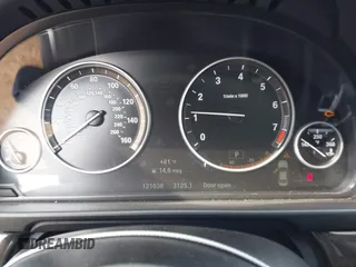 2015 BMW 5 Series 528i with VIN WBA5A5C58FD520694, listed as a IAAI auction lot 41804906 with 121,636 mi miles. Bid and sale history available at carsss.com. Image 7.