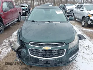 2015 Chevrolet Cruze LT with VIN 1G1PC5SB5F7217036, listed as a IAAI auction lot 41618670 with 141,615 mi miles and . Bid and sale history available at DreamBid. Image 12.
