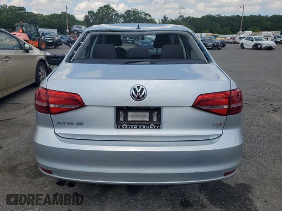 2015 Volkswagen Jetta SE z VIN 3VWD17AJ4FM417218, wystawiony jako Copart lot #61001125 z przebiegiem 84 159 mil mil oraz Szkoda całkowita • Salvage title. Historia ofert i sprzedaży dostępna na DreamBid. Obrazek 6.