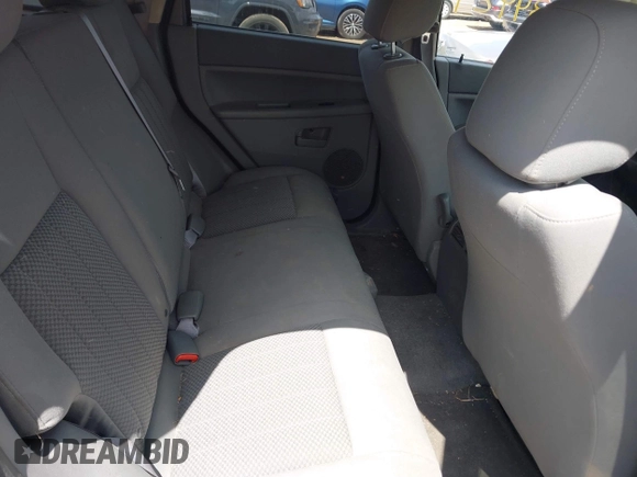 2005 Jeep Grand Cherokee Laredo with VIN 1J4GR48K55C573607, listed as a IAAI auction lot 42834424 with 130,275 mi miles and . Bid and sale history available at DreamBid. Image 8.
