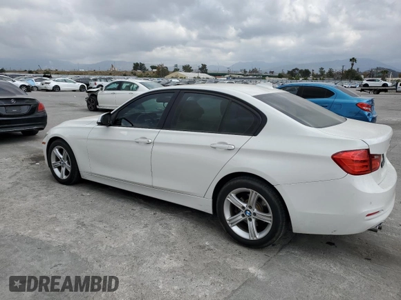 2015 BMW 3 Series 328i with VIN WBA3C1C55FK120405, listed as a Copart auction lot 54374035 with 121,411 mi miles and Salvage title. Bid and sale history available at DreamBid. Image 2.