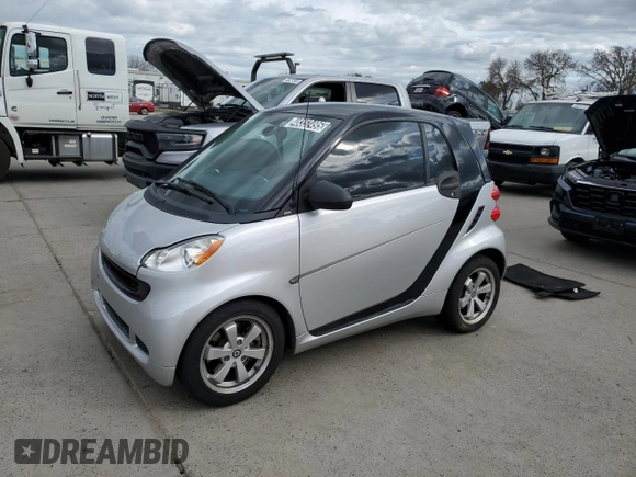 2012 Smart fortwo Pure z VIN WMEEJ3BA2CK549445, wystawiony jako Copart lot #48352495 z przebiegiem 53 406 mil mil oraz Tytuł czysty. Historia ofert i sprzedaży dostępna na DreamBid. Obrazek 1.