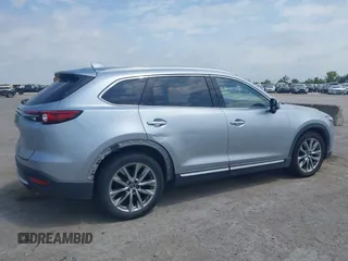 2016 Mazda CX-9 Signature with VIN JM3TCBEY9G0117785, listed as a IAAI auction lot 42331883 with 115,096 mi miles and . Bid and sale history available at DreamBid. Image 6.
