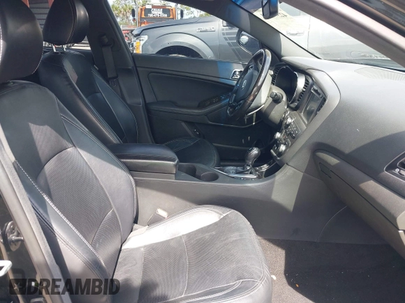 2013 Kia Optima SX with VIN 5XXGR4A61DG100479, listed as a IAAI auction lot 42376261 with 201,615 mi miles and . Bid and sale history available at DreamBid. Image 5.
