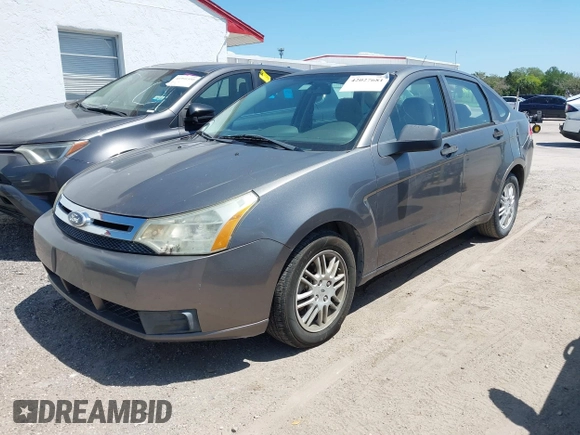 2011 Ford Focus SE with VIN 1FAHP3FN4BW174842, listed as a IAAI auction lot 42027681 with 58,616 mi miles. Bid and sale history available at carsss.com. Image 2.