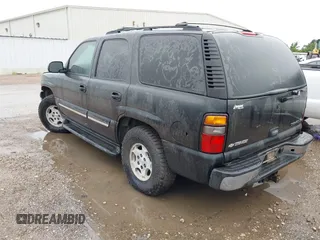 2005 Chevrolet Tahoe Z71 z VIN 1GNEC13T05R232584, wystawiony jako IAAI lot #42478633 z przebiegiem Nie podano mil oraz . Historia ofert i sprzedaży dostępna na DreamBid. Obrazek 3.