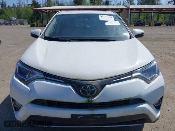 2018 Toyota RAV4 XLE with VIN JTMWFREV3JD130995, listed as a IAAI auction lot 42183630 with 56,624 mi miles. Bid and sale history available at carsss.com. Image 13.