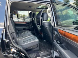2018 Lexus LX 570 with VIN JTJHY7AX8J4258452, listed as a Copart auction lot 57357365 with 131,556 mi miles and Clean title. Bid and sale history available at DreamBid. Image 6.