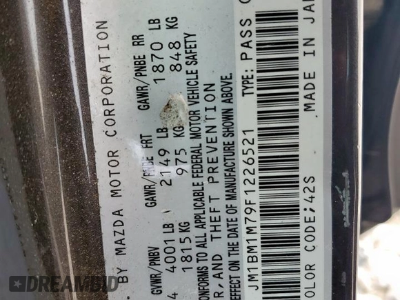 2015 Mazda 3 i Grand Touring with VIN JM1BM1M79F1226521, listed as a Copart auction lot 60328335 with 104,079 mi miles and Salvage title. Bid and sale history available at DreamBid. Image 12.