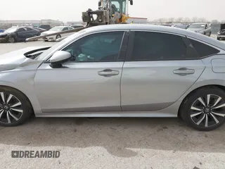 2023 Honda Civic EX with VIN 2HGFE1F77PH321210, listed as a IAAI auction lot 41797011 with 8,748 mi miles and . Bid and sale history available at DreamBid. Image 14.