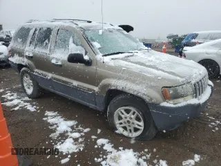 2004 Jeep Grand Cherokee Laredo with VIN 1J4GW48N94C408435, listed as a Copart auction lot 53101955 with Not provided miles and Clean title. Bid and sale history available at DreamBid. Image 4.