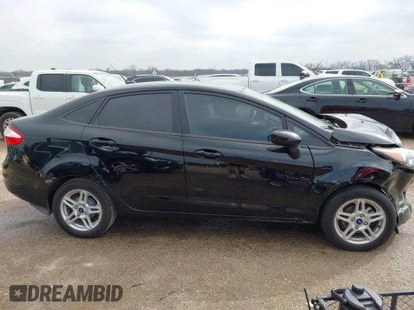2019 Ford Fiesta SE z VIN 3FADP4BJ7KM158142, wystawiony jako IAAI lot #41510806 z przebiegiem 55 315 mil mil oraz . Historia ofert i sprzedaży dostępna na DreamBid. Obrazek 13.