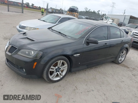 2009 Pontiac G8 with VIN 6G2ER57789L232134, listed as a IAAI auction lot 41864803 with 166,717 mi miles. Bid and sale history available at carsss.com. Image 2.