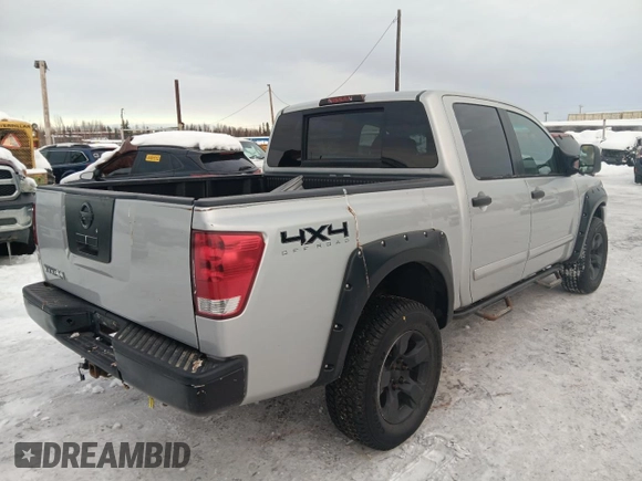 2005 Nissan Titan SE with VIN 1N6BA07B15N535701, listed as a Copart auction lot 46502565 with 180,923 mi miles and Salvage Title. Bid and sale history available at DreamBid. Image 3.