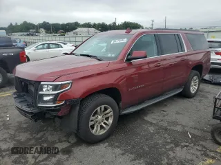 2016 Chevrolet Suburban LT with VIN 1GNSKHKC0GR156559, listed as a Copart auction lot 64770555 with 116,746 mi miles and Salvage title. Bid and sale history available at DreamBid. Image 1.