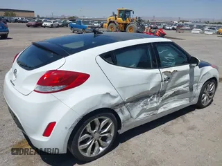 2014 Hyundai Veloster RE:FLEX with VIN KMHTC6AD7EU214911, listed as a IAAI auction lot 42617066 with 115,521 mi miles and . Bid and sale history available at DreamBid. Image 4.