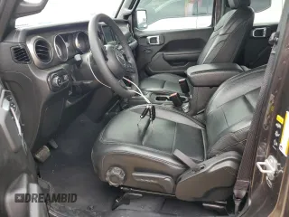 2023 Jeep Gladiator Freedom с VIN 1C6HJTAG5PL562148, выставлен на аукционе Copart как лот 53253005 с пробегом 18 076 миль миль и Списание • Salvage title. История ставок и продаж доступна на DreamBid. Изображение 7.
