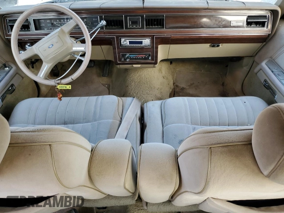 1986 Ford Crown Victoria z VIN 2FABP43F4GX118923, wystawiony jako Copart lot #76413794 z przebiegiem 74 097 mil mil oraz Tytuł czysty. Historia ofert i sprzedaży dostępna na DreamBid. Obrazek 8.