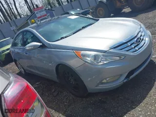 2013 Hyundai Sonata SE with VIN 5NPEC4AC9DH784460, listed as a IAAI auction lot 42099724 with 152,744 mi miles. Bid and sale history available at carsss.com. Image 1.